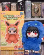 Naruto Shippuden Sasuke plush vinyl figure in blue fuzzy costume with Sharingan eyes